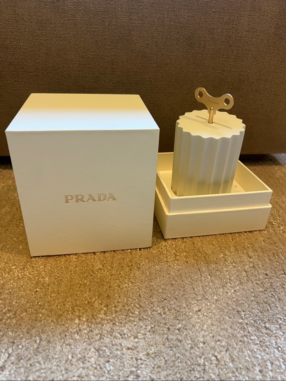 Prada Cream Ivory Sculpted Candle with Branded Wind-Up Key